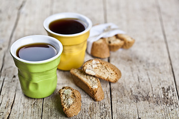 Image showing Two cups of coffee, fresh Italian cookies cantuccini and almond 