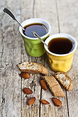 Image showing Two cups of coffee and fresh Italian cookies cantuccini with alm