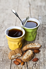 Image showing Two cups of coffee, fresh Italian cookies cantuccini and almond 