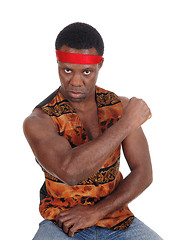 Image showing Serious looking African man in a vest