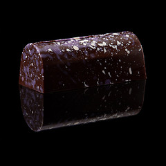 Image showing chocolate candy on black background