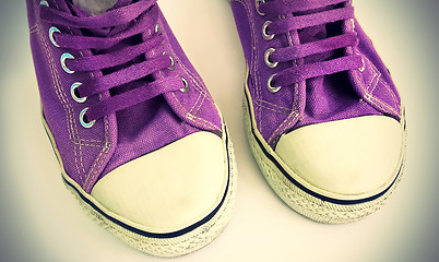 Image showing Old lilac sneakers, close-up