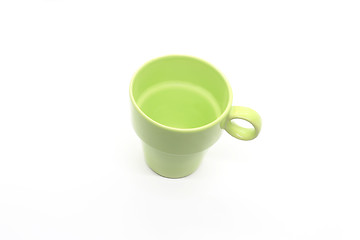 Image showing Bright green ceramic cup with handle