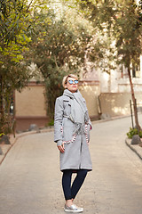 Image showing Young blond woman with sunglases on the street