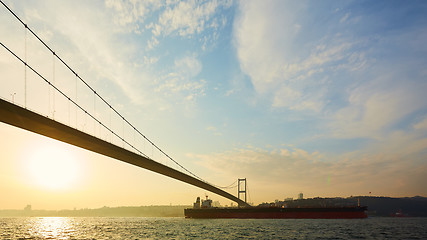 Image showing Turkey, Istanbul, Bosphorus Channel, Bosphorus Bridge, an cargo ship under the Bridge.