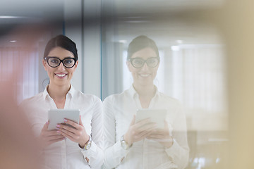 Image showing Business Woman Using Digital Tablet in front of startup Office