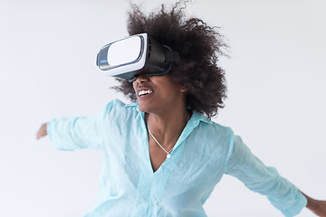 Image showing black girl using VR headset glasses of virtual reality