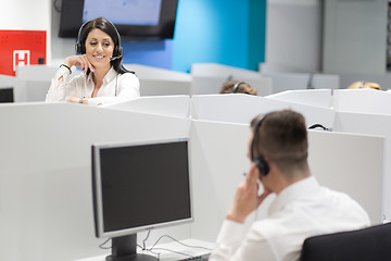 Image showing female call centre operator doing her job