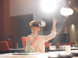 Image showing businesswoman using VR-headset glasses of virtual reality