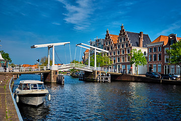 Image showing Spaarne river with boat and Gravestenenbrug bridge in Haarlem, N