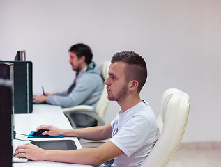 Image showing Graphic Designer Working at Workplace