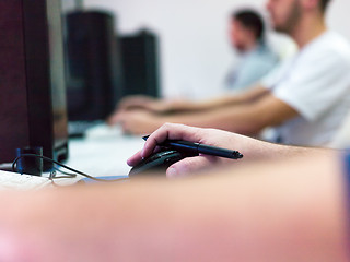 Image showing Closeup of Graphic Designer Working at Workplace