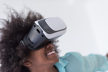 Image showing black girl using VR headset glasses of virtual reality