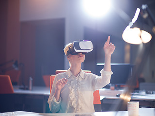 Image showing businesswoman using VR-headset glasses of virtual reality