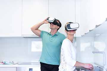 Image showing young couple using VR-headset glasses of virtual reality