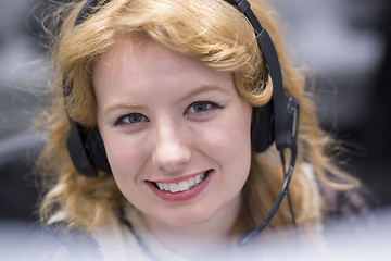 Image showing female call centre operator doing her job