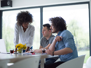 Image showing Multiethnic startup Business Team At A Meeting at modern office 