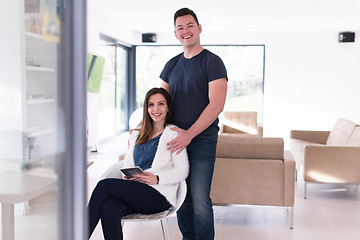 Image showing couple using tablet at home