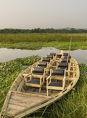 Image showing tourist boat with chairs in the jungle river