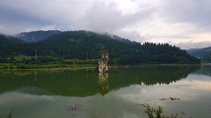 Image showing Rock and lake, surrounded by the forest