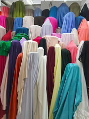 Image showing Stock of fabrics roll for sale in market