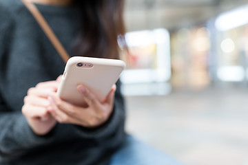 Image showing Woman working on smart phone