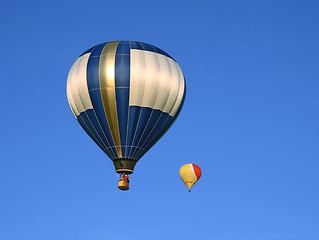 Image showing Two hot air balloons in the blue sky