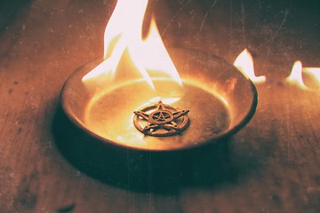 Image showing Old pentagram burning in flames