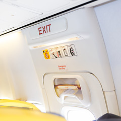 Image showing Closeup shot of emergency exit door in airplane