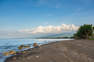 Image showing a dark sand beach in northern Bali Indonesia