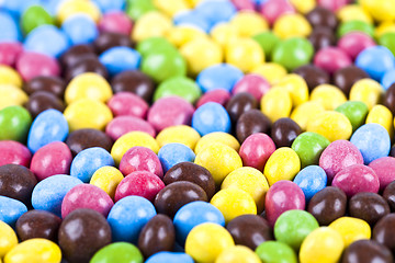 Image showing Pile of delicious ainbow colorful chocolate candies.