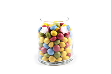 Image showing Colorful sweet candies in glass jar isolated on white.