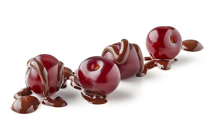 Image showing sour cherries covered with melted chocolate