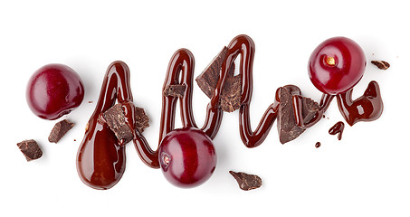 Image showing sour cherries and melted chocolate