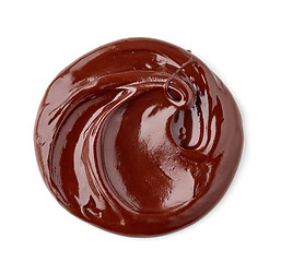 Image showing melted chocolate on white background