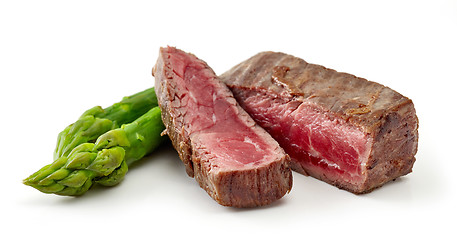 Image showing beef wagyu steak meat with asparagus isolated on wight backgroun