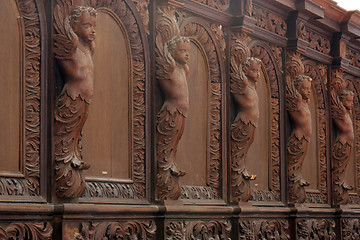 Image showing A row of church pews in the old Church