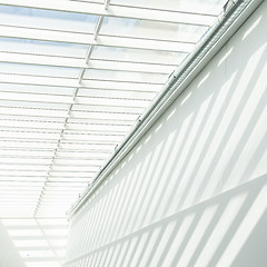 Image showing Geometric shapes and patterns in contemporary architecture. Shadow on the white wall.