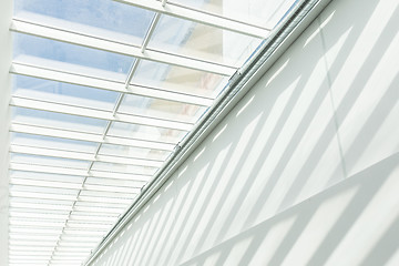 Image showing Geometric shapes and patterns in contemporary architecture. Shadow on the white wall.