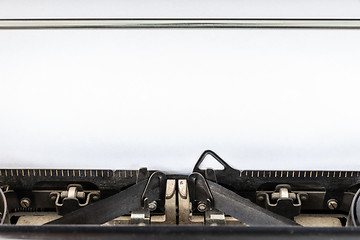 Image showing Vintage typewriter with blank sheet of paper retro technology