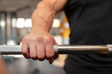 Image showing grabbing a dumbbell