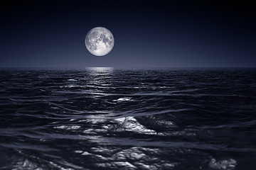 Image showing wide ocean waves horizon moon night background