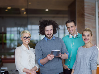 Image showing group of Business People Working With Tablet in startup office