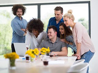 Image showing Multiethnic startup Business Team At A Meeting at modern office 