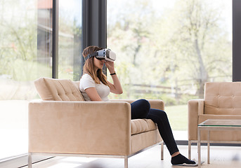 Image showing woman using VR-headset glasses of virtual reality