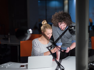 Image showing designers in the night startup office