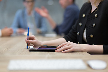 Image showing businesswoman hand using pen