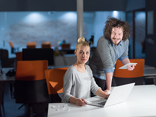 Image showing designers in the night startup office