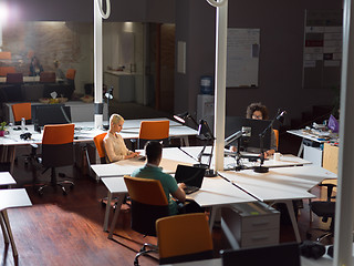 Image showing designers in the night startup office