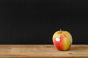 Image showing black background apple wooden table